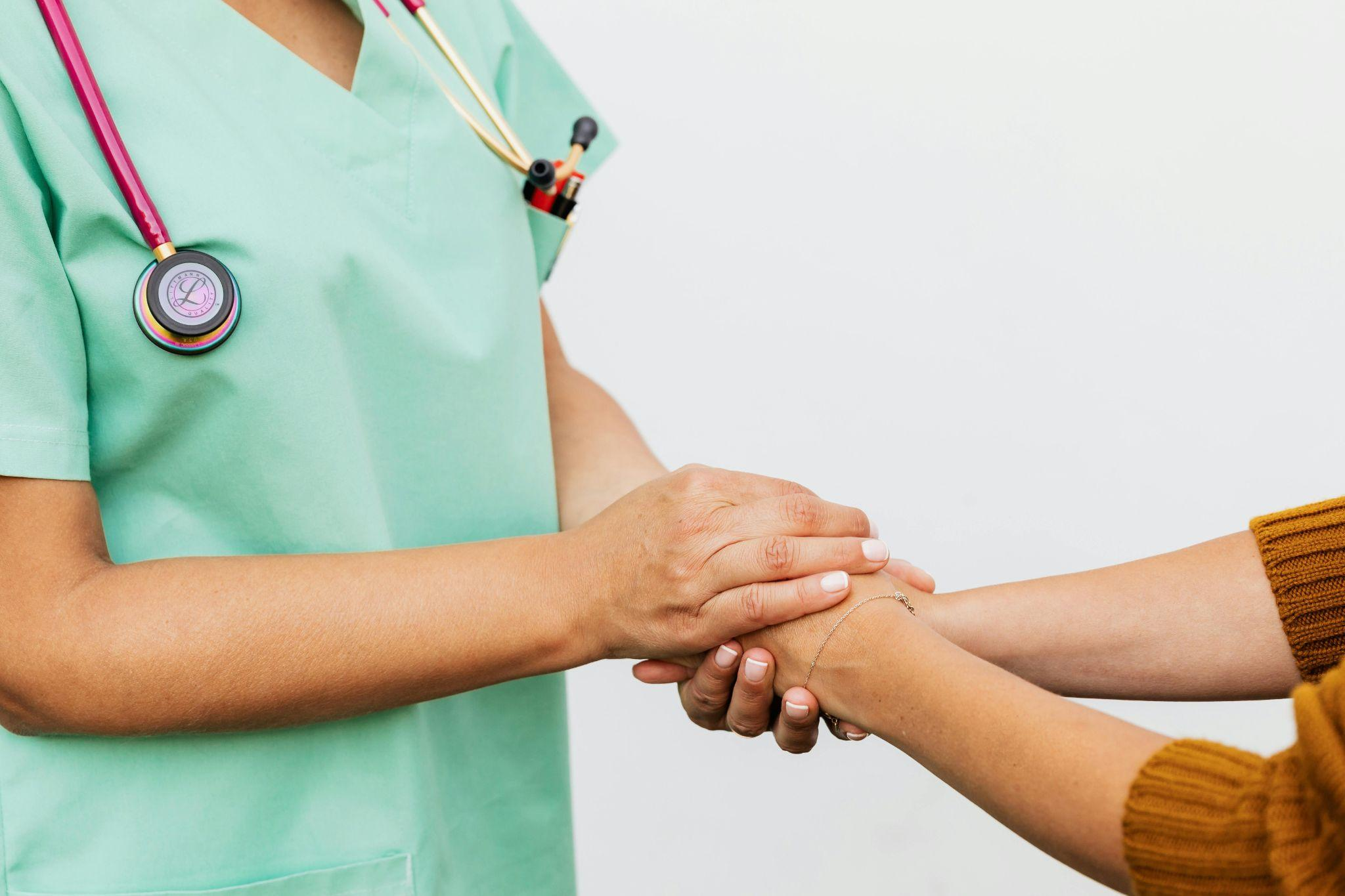 https://www.pexels.com/photo/a-doctor-and-patient-doing-handshake-5206923/