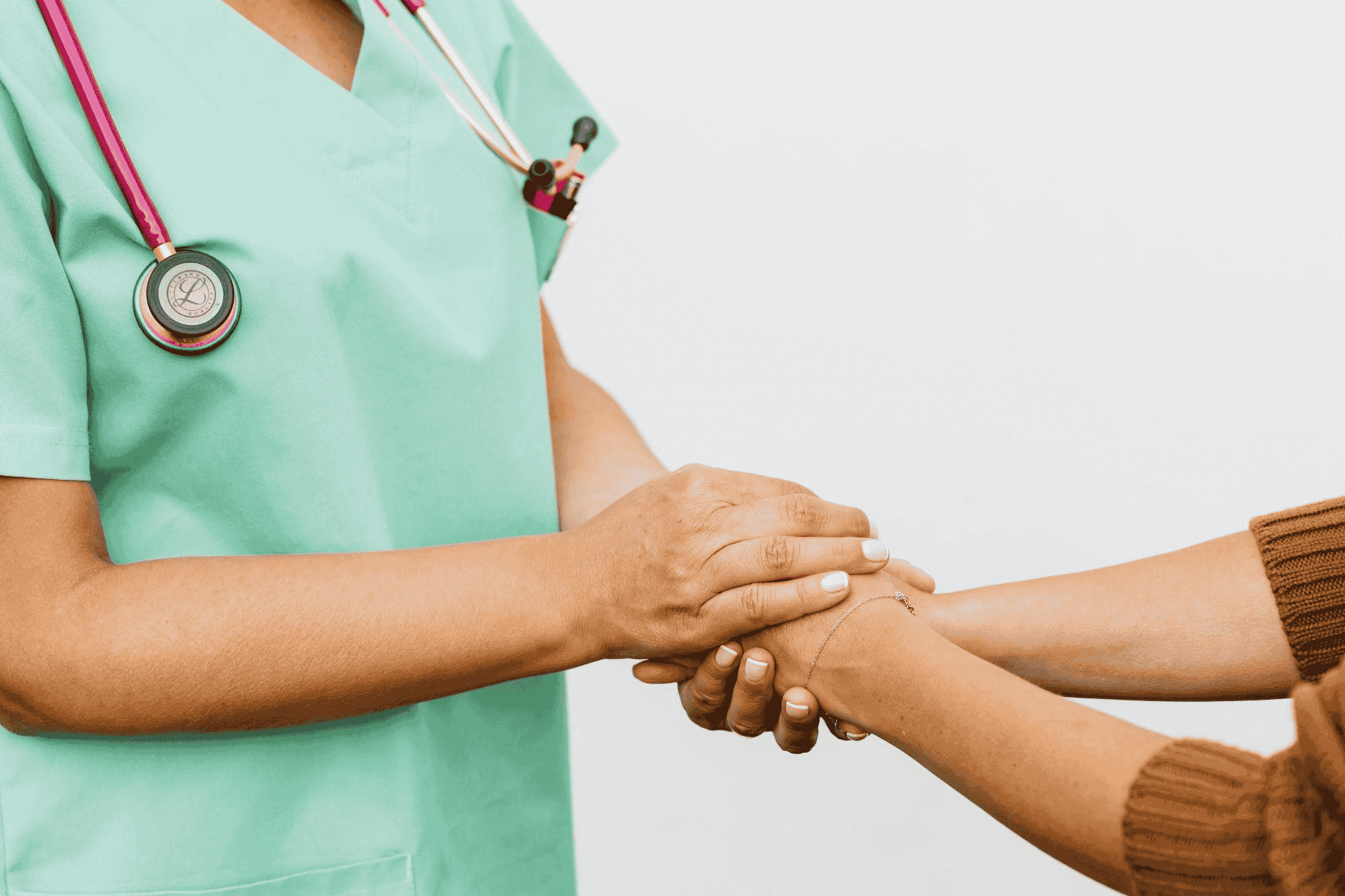 https://www.pexels.com/photo/a-doctor-and-patient-doing-handshake-5206923/